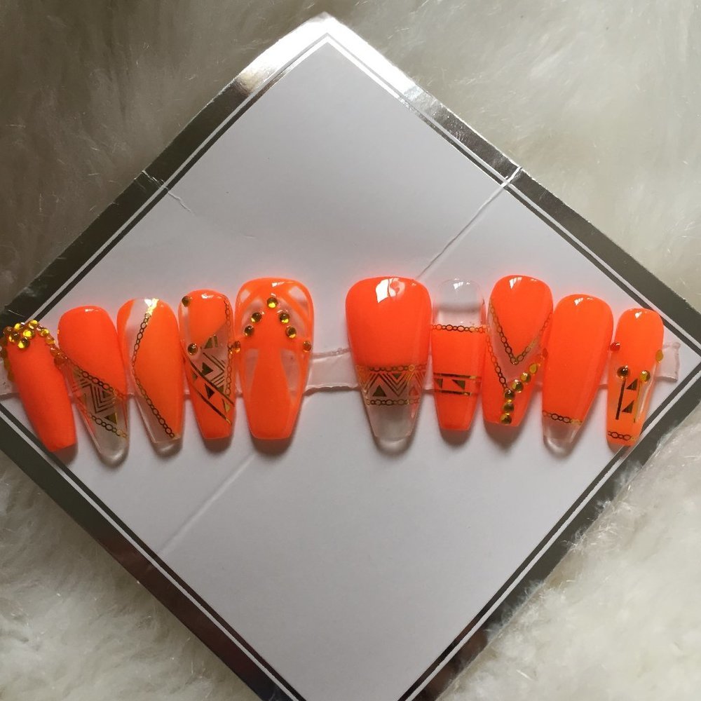 Neon Orange Indigenous Pride gold tribal nails